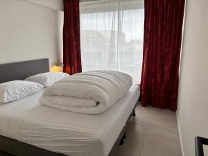 Ένα ή περισσότερα κρεβάτια σε δωμάτιο στο Northsea