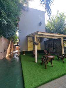 Κήπος έξω από το Pinsker Apartments