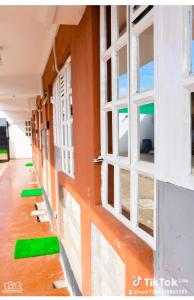 an empty room with windows on the side of a building at Luxe-homestay 1 Bed Executive Studio in Eldoret