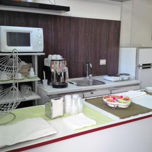 Una cocina o zona de cocina en Donna Lucrezia Residence