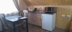 Η κουζίνα ή μικρή κουζίνα στο KOMFORT