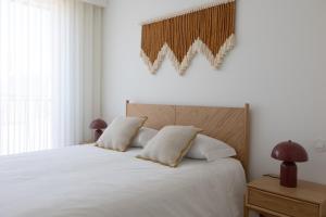 Ένα ή περισσότερα κρεβάτια σε δωμάτιο στο My Home is Yours