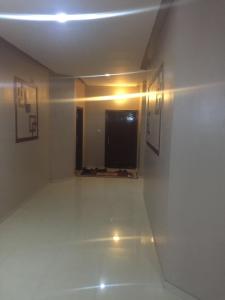 a room with a white floor and a window at شقة غرفتين وصالة 5 in Al Baha