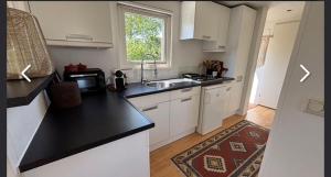 Η κουζίνα ή μικρή κουζίνα στο gezellige chalet cadzand Zeeland