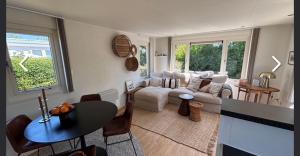 Χώρος καθιστικού στο gezellige chalet cadzand Zeeland