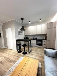 Η κουζίνα ή μικρή κουζίνα στο SILESIAN LOFT Apartment