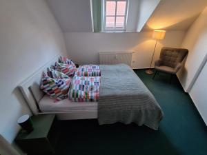 Ένα ή περισσότερα κρεβάτια σε δωμάτιο στο Ferienwohnung an der Kirchruine