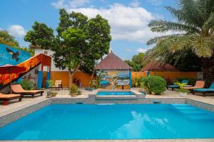 Bazén v ubytování Mango Lodge Gambia nebo v jeho okolí + 18 fotografií