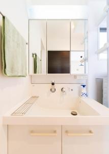 Et tv og/eller underholdning på tazuraya-sakuramachi-一棟貸切-無料駐車場 + 36 billeder