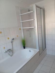 Ванная комната в Ferienwohnung Margit am Park +15 фотографий