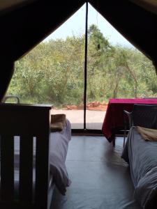 Ένα ή περισσότερα κρεβάτια σε δωμάτιο στο Mara Green Heart