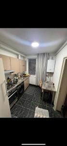 Η κουζίνα ή μικρή κουζίνα στο Apartament 2 camere