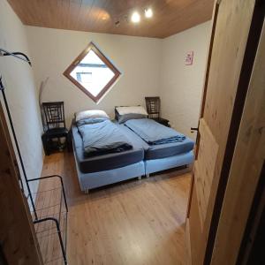 Postel nebo postele na pokoji v ubytování Haus Neckarblick