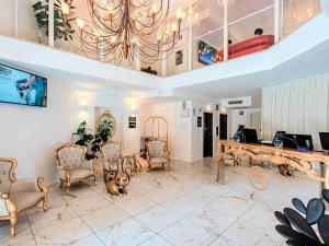 Телевизор и/или развлекательный центр в B&B Hotel Firenze Laurus Al Duomo