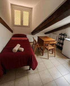 Ένα ή περισσότερα κρεβάτια σε δωμάτιο στο Elohim Center