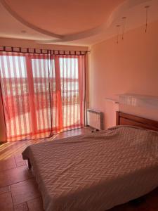 Ένα ή περισσότερα κρεβάτια σε δωμάτιο στο Вапнярка