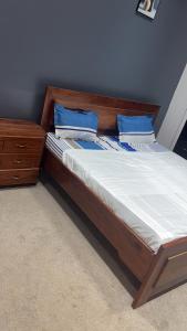 Ένα ή περισσότερα κρεβάτια σε δωμάτιο στο Malti business