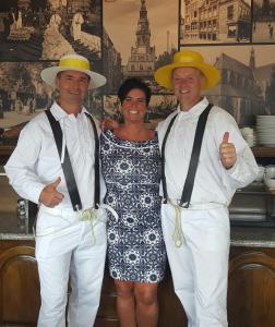 two men and a woman giving the thumbs up at Hotel Stad en Land in Alkmaar