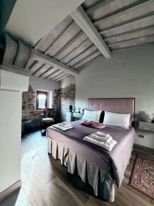 Ένα ή περισσότερα κρεβάτια σε δωμάτιο στο Il Sassello