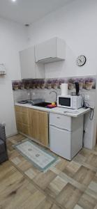 Η κουζίνα ή μικρή κουζίνα στο Cichy Zaułek 9A