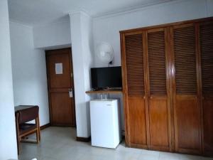 TV a/nebo společenská místnost v ubytování Hotel Balcones De Malibu