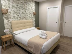 Ένα ή περισσότερα κρεβάτια σε δωμάτιο στο El Helecho de Gredos