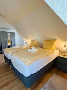 Кровать или кровати в номере City Stay Schwenningen