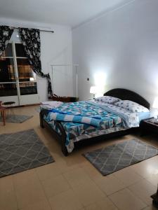 Postel nebo postele na pokoji v ubytování Chambre Douillet Pour Nuit Complice