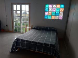 Ένα ή περισσότερα κρεβάτια σε δωμάτιο στο Casa chapadmalal