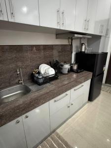 Kuchyň nebo kuchyňský kout v ubytování kyros crib