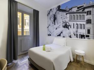 Postel nebo postele na pokoji v ubytování B&B Hotel Roma Italia Viminale