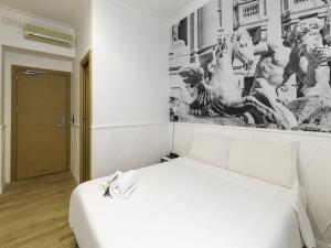 Postel nebo postele na pokoji v ubytování B&B Hotel Roma Italia Viminale + 15 fotografií