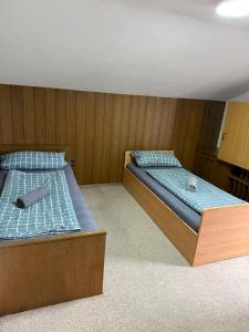 Ένα ή περισσότερα κρεβάτια σε δωμάτιο στο OH 4