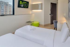 Ένα ή περισσότερα κρεβάτια σε δωμάτιο στο B&B Hotel Milano Sesto Marelli