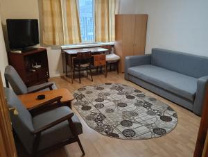 Χώρος καθιστικού στο Downtown Studio Apartament