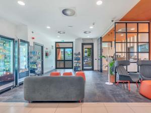 Χώρος καθιστικού στο B&B Hotel Bergamo City +28 φωτογραφίες