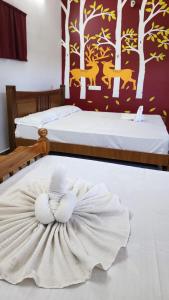 Postel nebo postele na pokoji v ubytování Happy Mates Forest Retreat - TIE + 57 fotografií