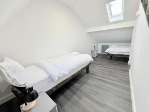 Postel nebo postele na pokoji v ubytování Alisha Town House