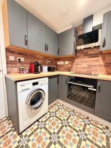 Kuchyň nebo kuchyňský kout v ubytování Alisha Town House + 31 fotografií