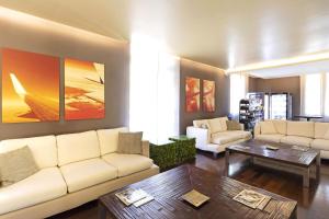 Χώρος καθιστικού στο B&B HOTEL Malpensa Lago Maggiore