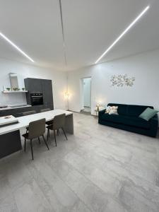 Η κουζίνα ή μικρή κουζίνα στο Mongibello Apartment