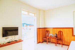 Un televizor și/sau centru de divertisment la An Phu Hotel Nha Trang