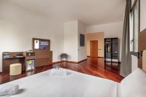 Ένα ή περισσότερα κρεβάτια σε δωμάτιο στο B&B Hotel Sassuolo