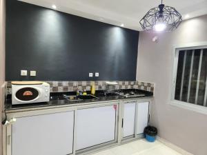 O bucătărie sau chicinetă la Family Suite - 2CH dont 1 en option ou payante ET1D