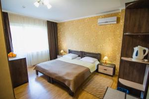 Posteľ alebo postele v izbe v ubytovaní Lileya Hotel