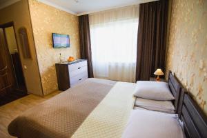 Posteľ alebo postele v izbe v ubytovaní Lileya Hotel