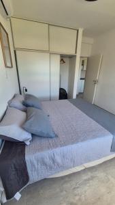 En eller flere senge i et værelse på MONACO Departamento PA + 9 billeder