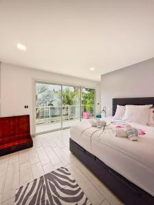 Ένα ή περισσότερα κρεβάτια σε δωμάτιο στο Villa NKH