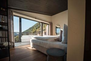 Ένα ή περισσότερα κρεβάτια σε δωμάτιο στο Bergchalet a n d e r s