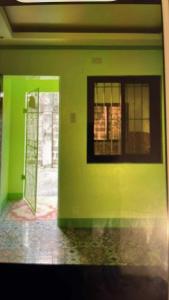 L&N house rental的绿色的墙壁,有门和窗户